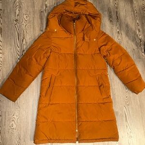 GU brown coat used just needs a fresh wash still in good condition